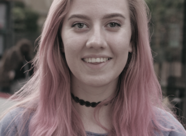 Teen with pink hair